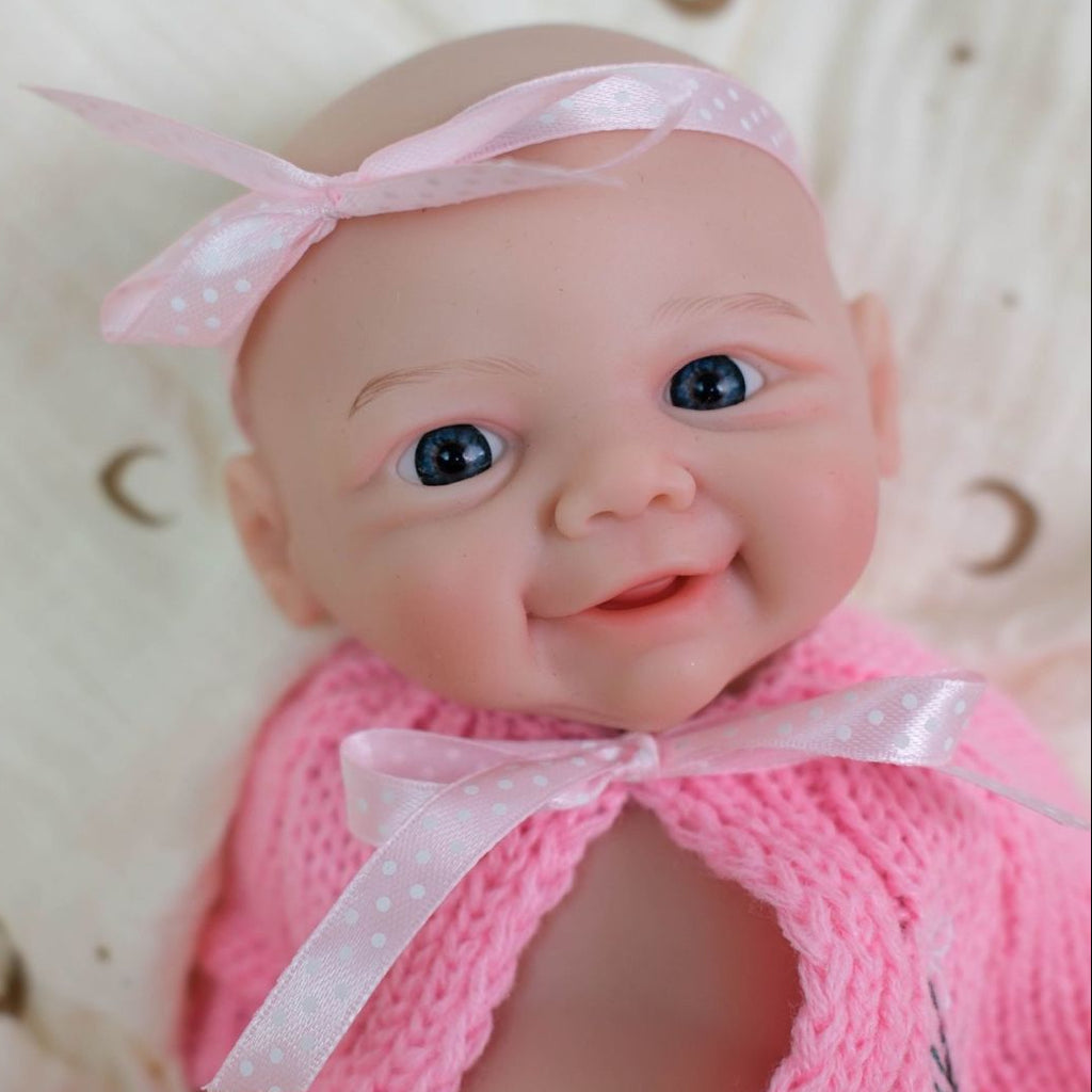 Muñeca bebé reborn de silicón sólido de 12 pulgadas Daisy Mae con boca abierta ✨ Extremidades elásticas, lavable, incluye conjunto de lazo de punto rosa