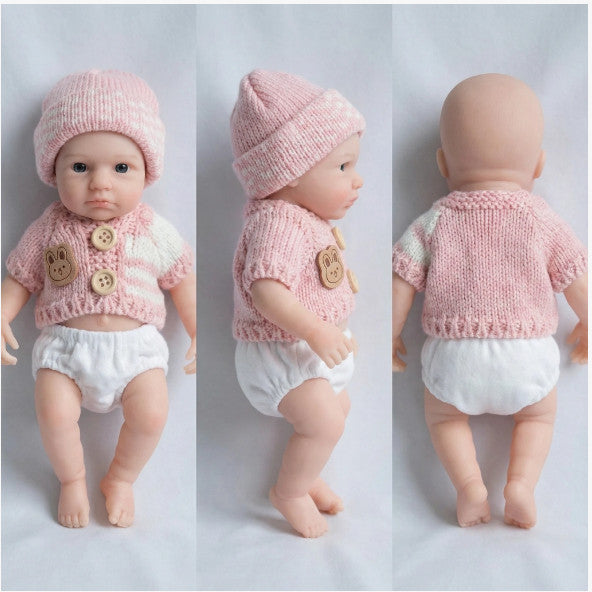 Luna Belle Muñeca Bebé Reborn de Silicona Sólida de 20cm ✨ Extremidades Estirables, Ojos Acrílicos de Taiwán, Traje de Conejito de Punto Rosa Incluido