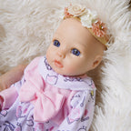 Flora – Realistic Body Silicone Reborn Baby Girl Doll 13" Open Eyes Blue Eyes Gift for Kids & Collectors [Ships Within 48 Hours]