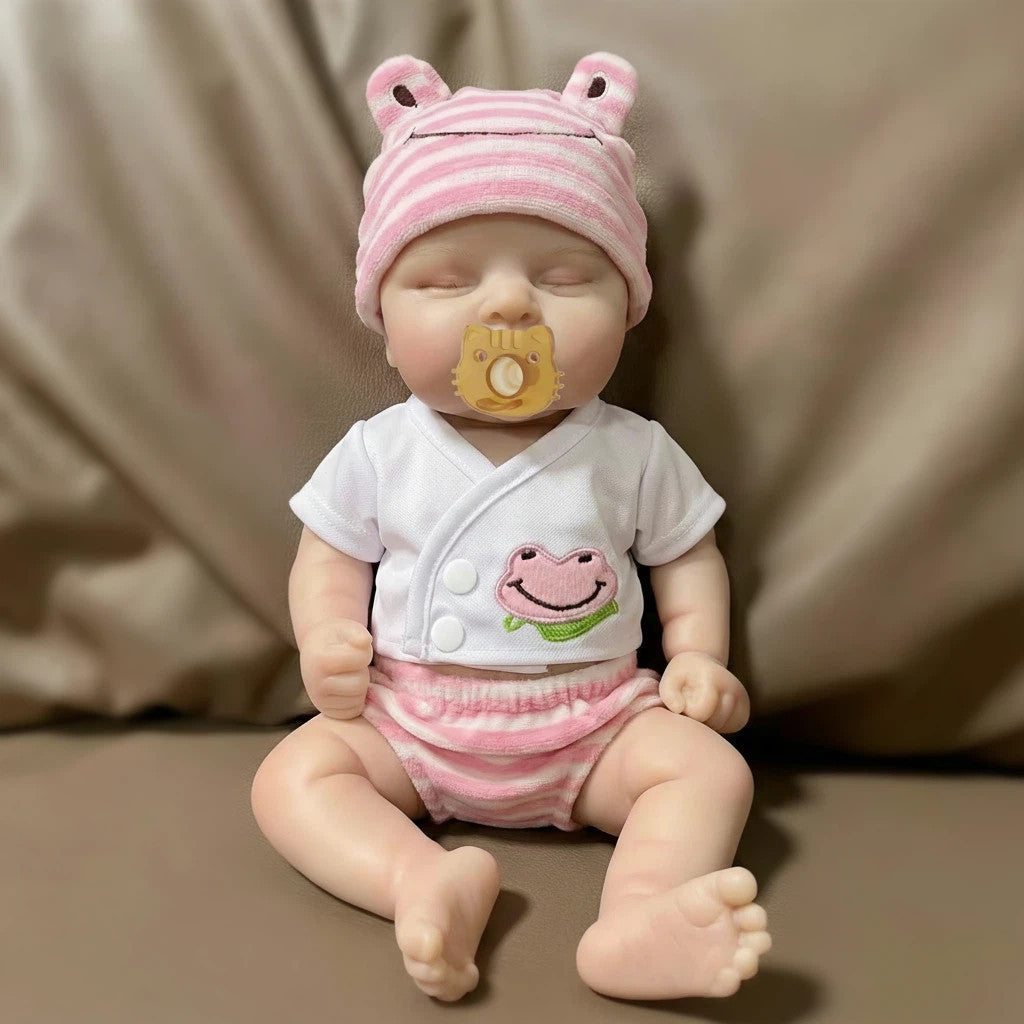 Froggy Mae Muñeca Reborn de Silicona Sólida de 12" Extremidades Estirables, Traje de Rana Incluido